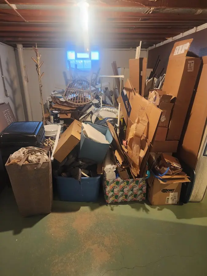 Roll-off dumpster container at job site for 2 Yard Dumpster Rental in Marion